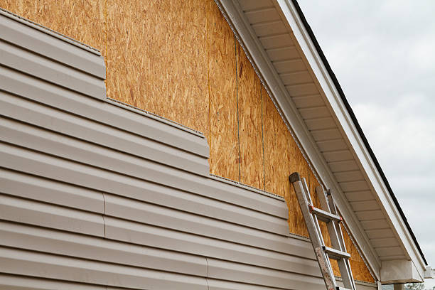 Professional Storm Damage Siding Repair technician working in West Linn, OR
